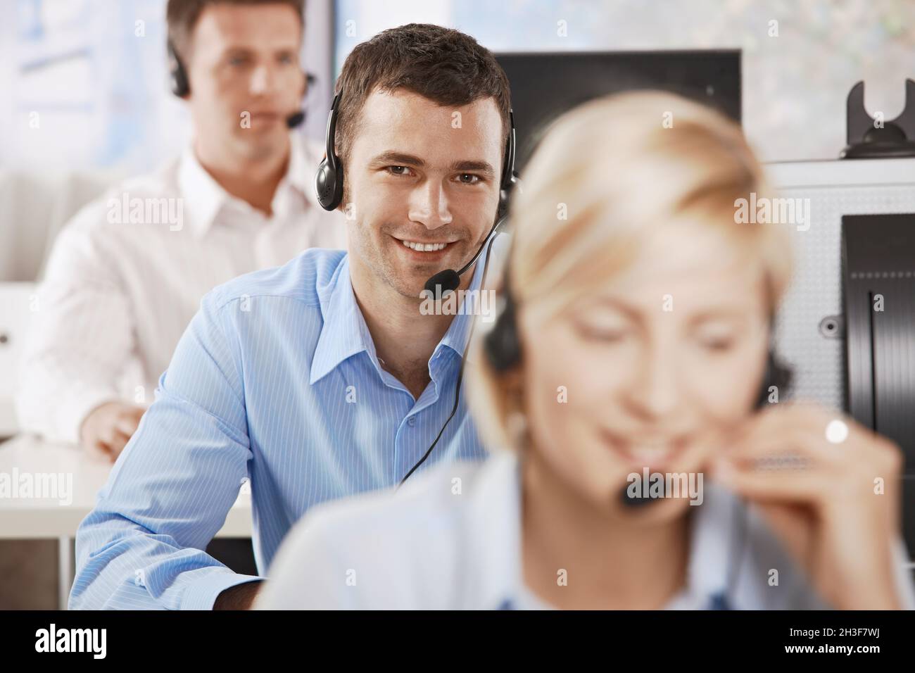Talking three coworkers wearing hi-res stock photography and images - Alamy