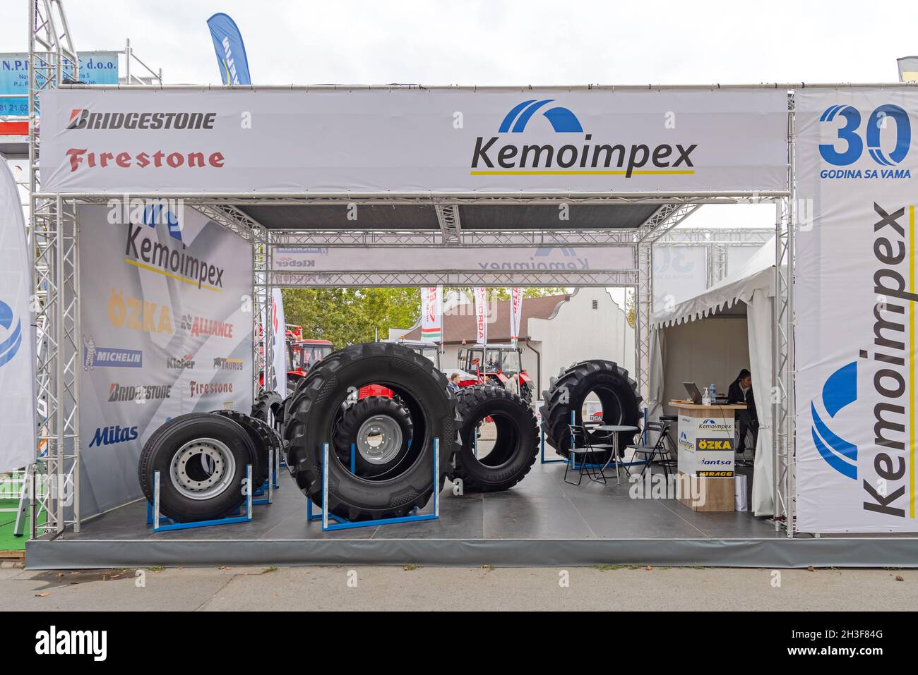 Novi Sad, Serbia - September 21, 2021: Bridgestone Firestone Tyres for Tractors and Combine Harvesters at Agriculture Expo Fair Kemoimpex Booth. Stock Photo