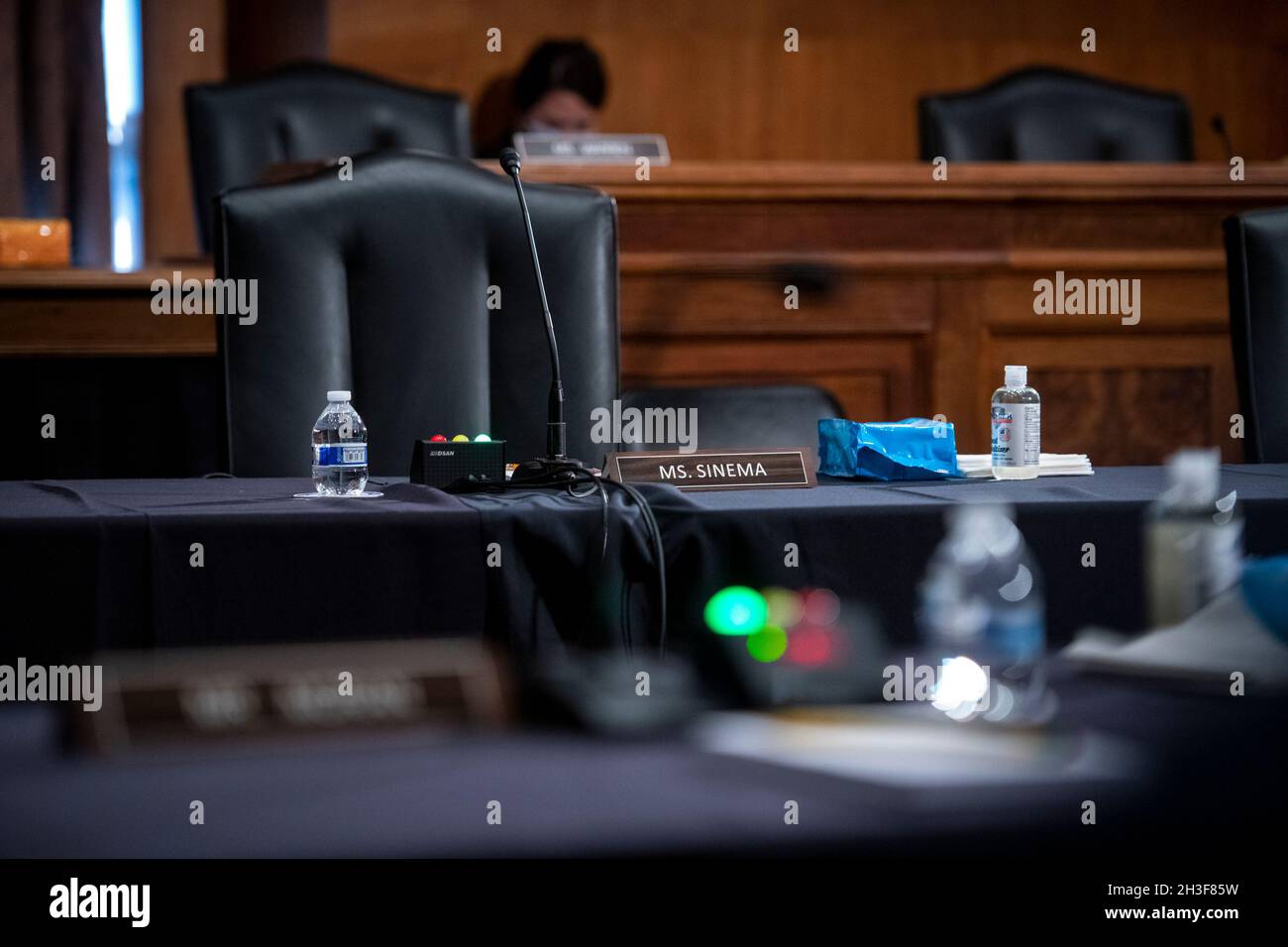 Washington, United States Of America. 28th Oct, 2021. The chair for United States Senator Kyrsten Sinema (Democrat of Arizona) is empty during a Senate Committee on Banking, Housing, and Urban Affairs hearing to examine the Consumer Financial Protection Bureau's Semi-Annual Report to Congress, in the Dirksen Senate Office Building in Washington, DC, Thursday, October 28, 2021. Credit: Rod Lamkey/CNP/Sipa USA Credit: Sipa USA/Alamy Live News Stock Photo