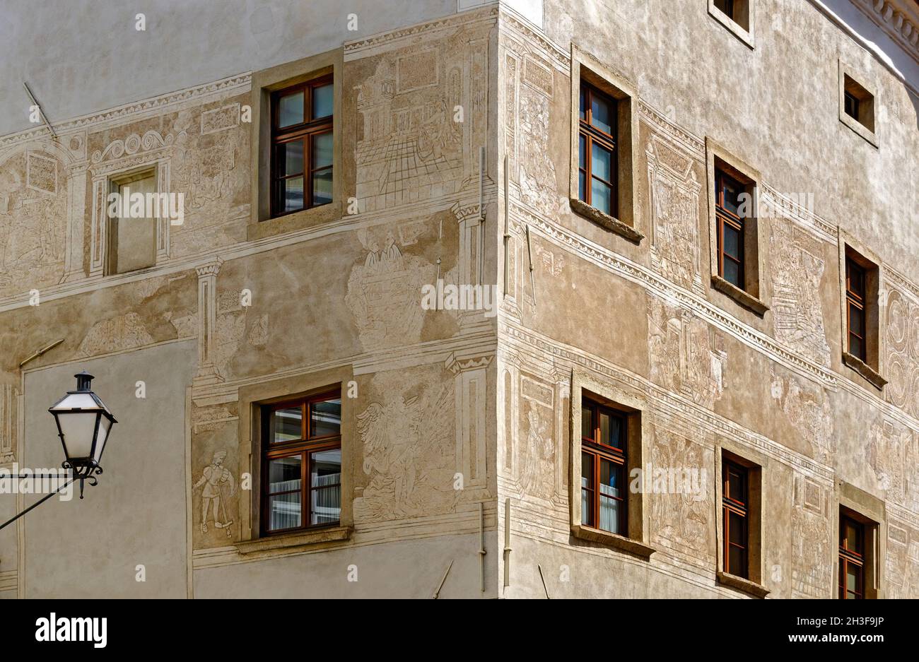 house corner with renaissance facades decorated with sgraffiti at Krems, Austria Stock Photo