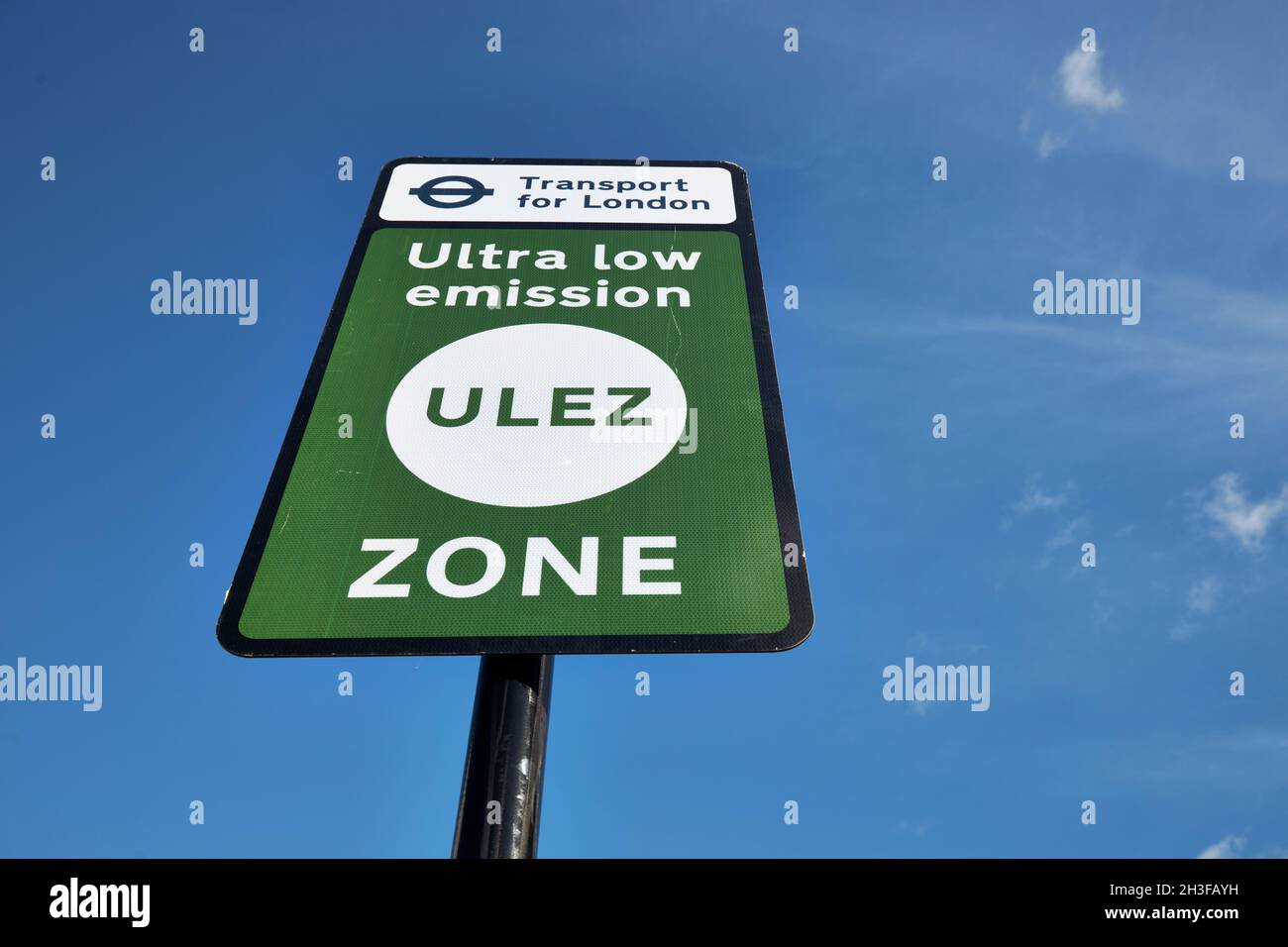 Green traffic sign for New Ultra Low Emission zone expanded from 25 October 2021 till the North and South circular. London, UK. Stock Photo