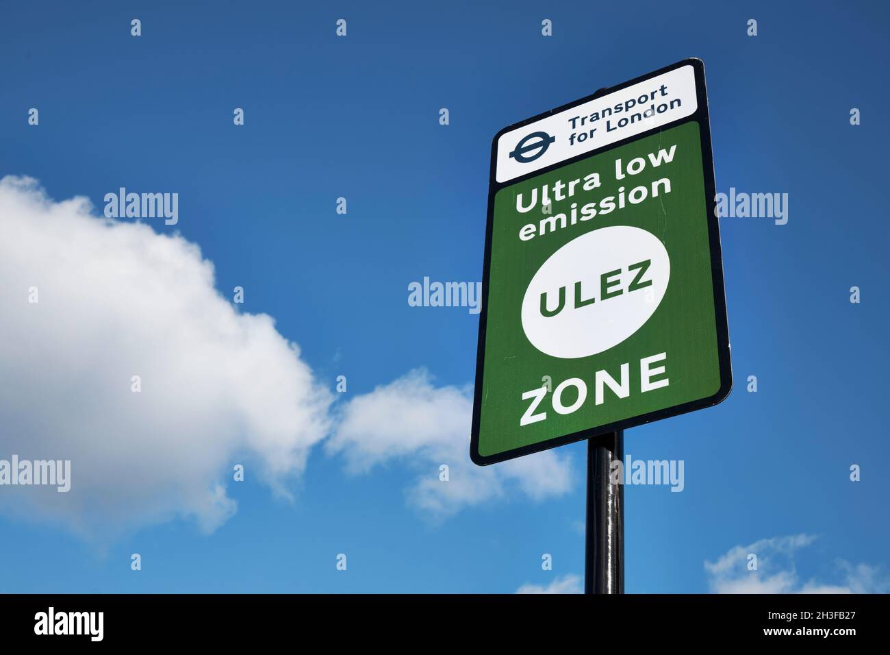 Green traffic sign for New Ultra Low Emission zone expanded from 25 October 2021 till the North and South circular. London, UK. Stock Photo