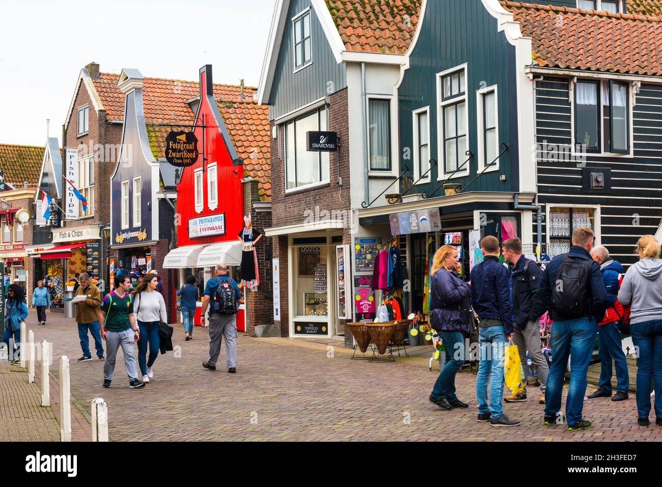 VOLENDAM, NETHERLANDS - SEPTEMBER 25, 2017: Volendam is a town in North Holland in the Netherlands. Colored houses of marine park in Volendam. North H Stock Photo