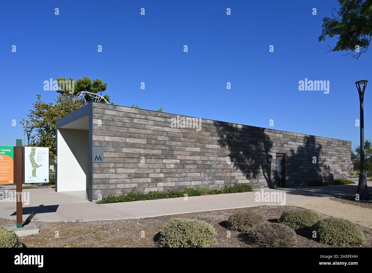 IRVINE, CALIFORNIA - 27 OCT 2021: Restrooms at the Benchmark entrance to the Great Park Trails,a  1.5 mile walking and biking space throughout the Upp Stock Photo