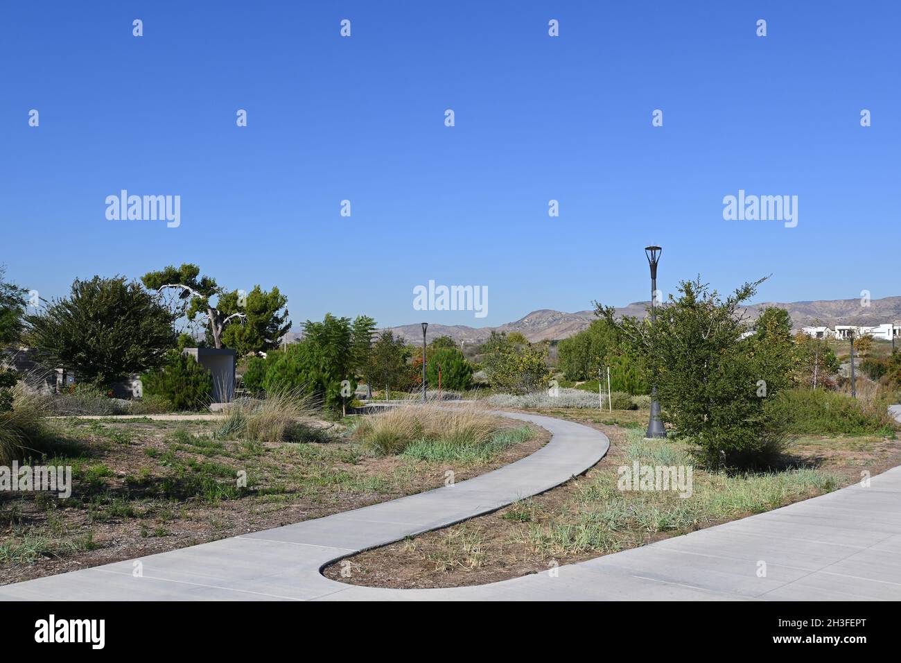 IRVINE, CALIFORNIA - 27 OCT 2021: Great Park Trails feature 1.5 miles of walking and biking space throughout the Upper Bee and Bosque area. Stock Photo