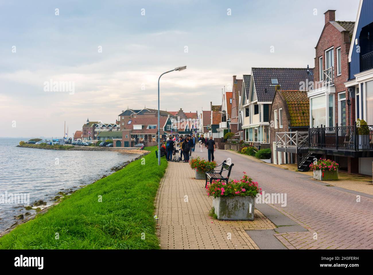 VOLENDAM, NETHERLANDS - SEPTEMBER 25, 2017: Volendam is a town in North Holland in the Netherlands. Colored houses of marine park in Volendam. North H Stock Photo