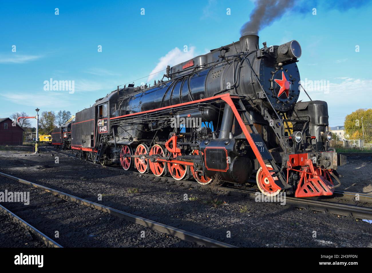 SORTAVALA, RUSSIA - OCTOBER 07, 2021: Soviet mainline freight steam locomotive of the 'L' series (L-4429, Lebedyanka) on access roads on a sunny Octob Stock Photo