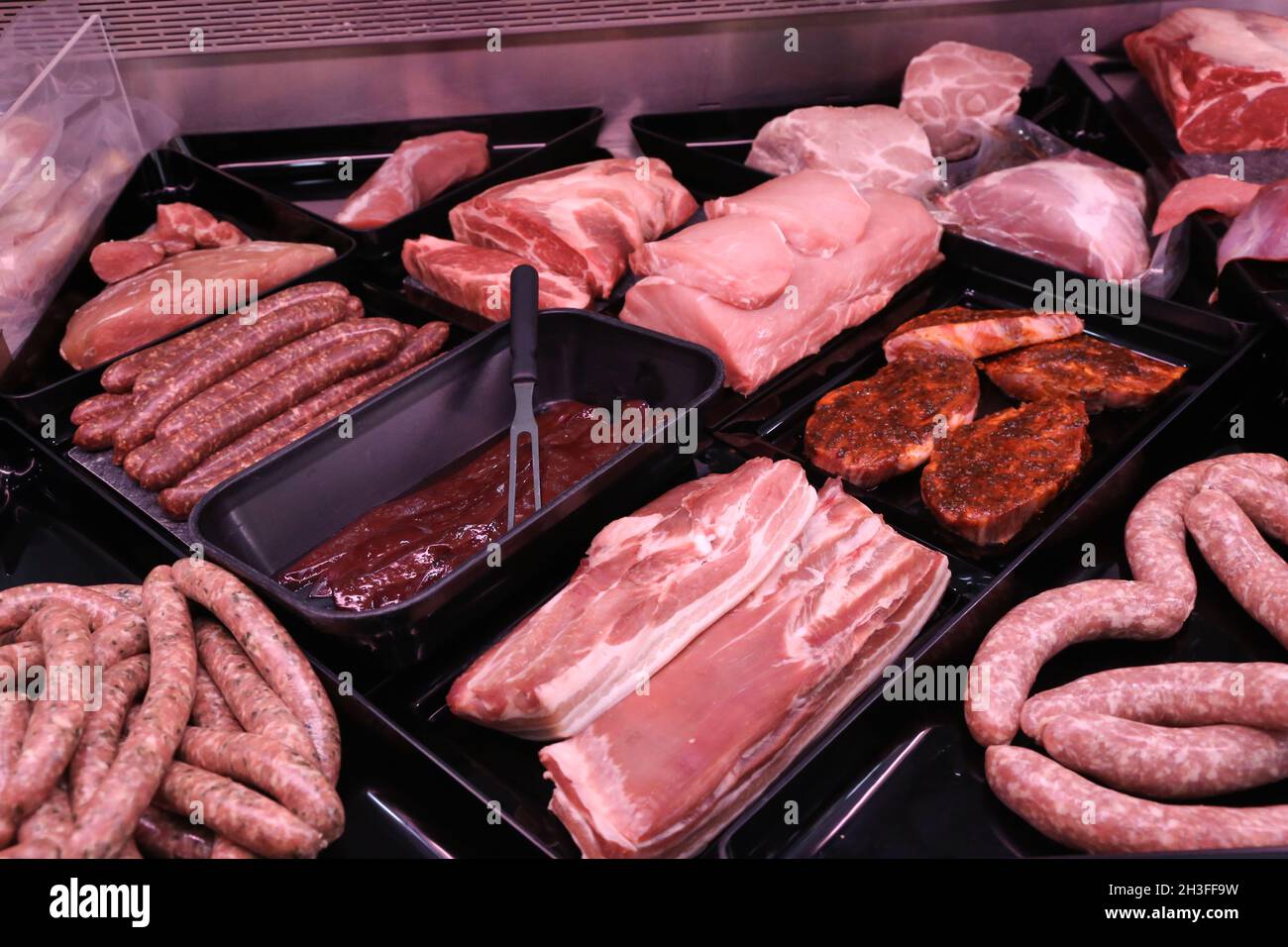 Variety of fine meat products in the butchery Stock Photo Alamy