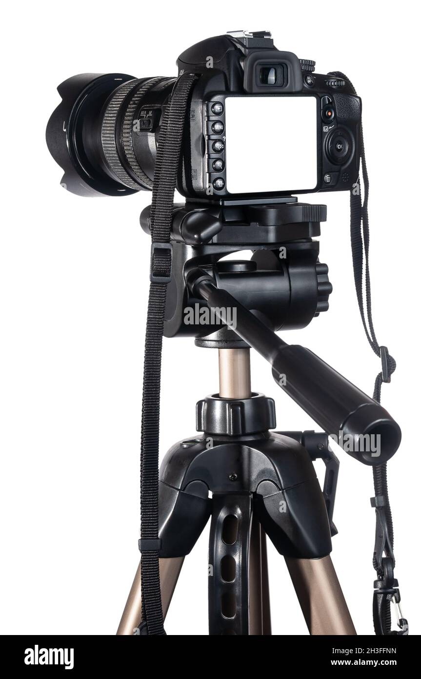 Modern DSLR camera on tripod isolated on white background Stock Photo