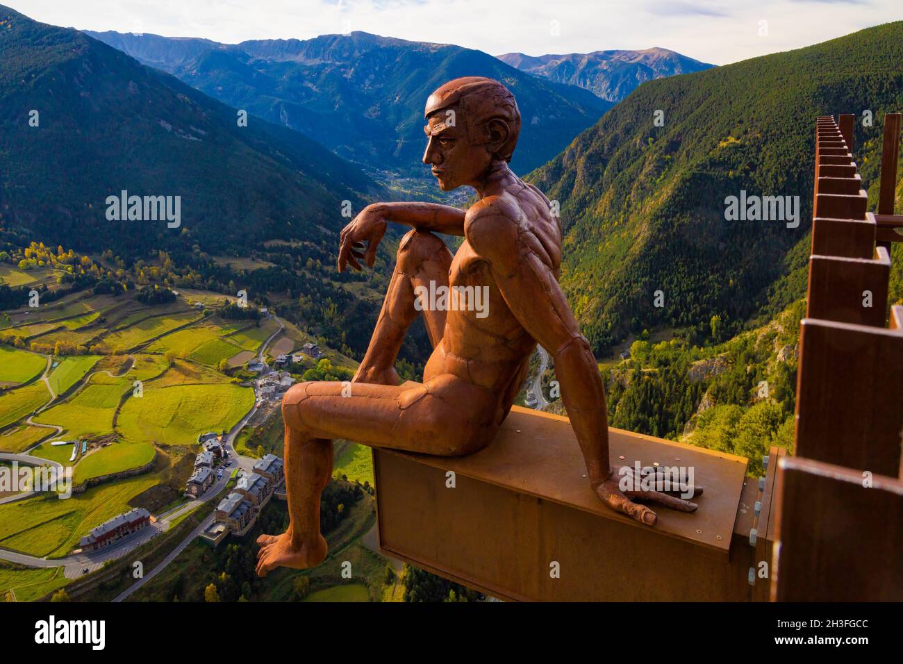 View of the statue of the Thinking Man, located on a platform on top of a cliff where the entire Canillo valley is dominated, Andorra Stock Photo