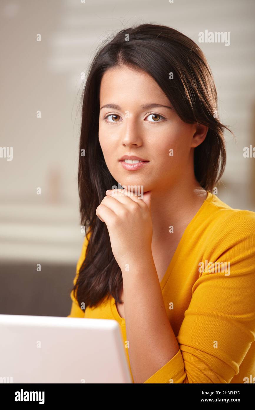 Portrait of smiling teenage girl Stock Photo - Alamy