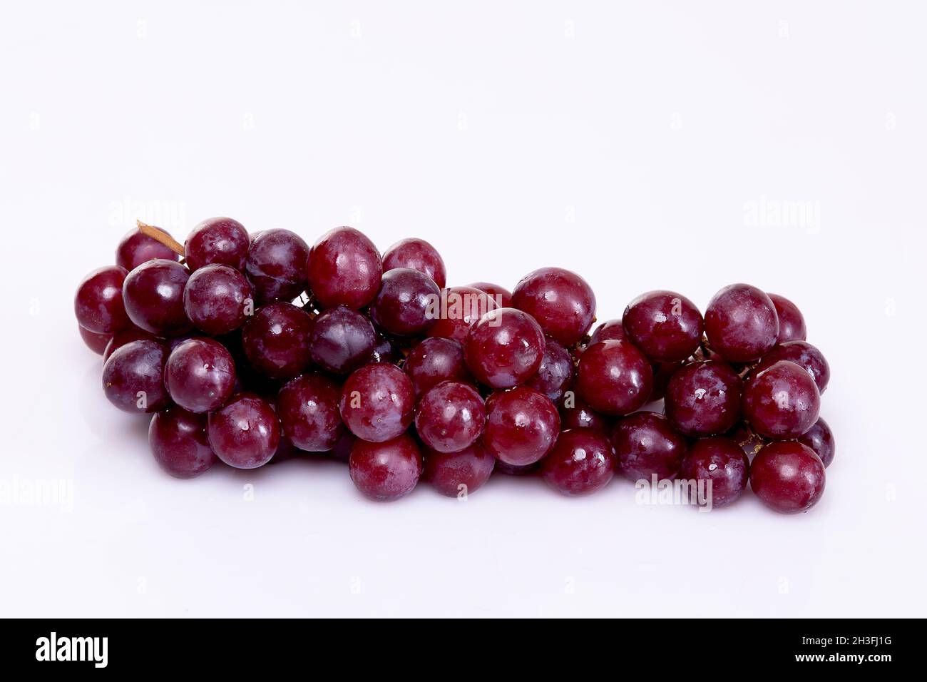 Fruits- The green grapes, red grapes, green apples and red apples Stock Photo