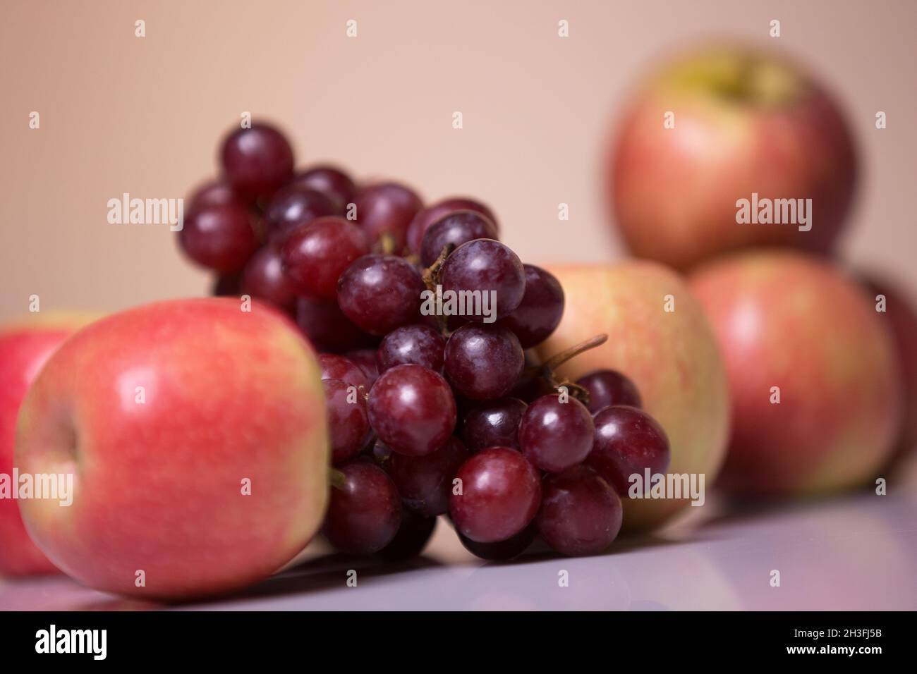 Fruits- The green grapes, red grapes, green apples and red apples Stock Photo