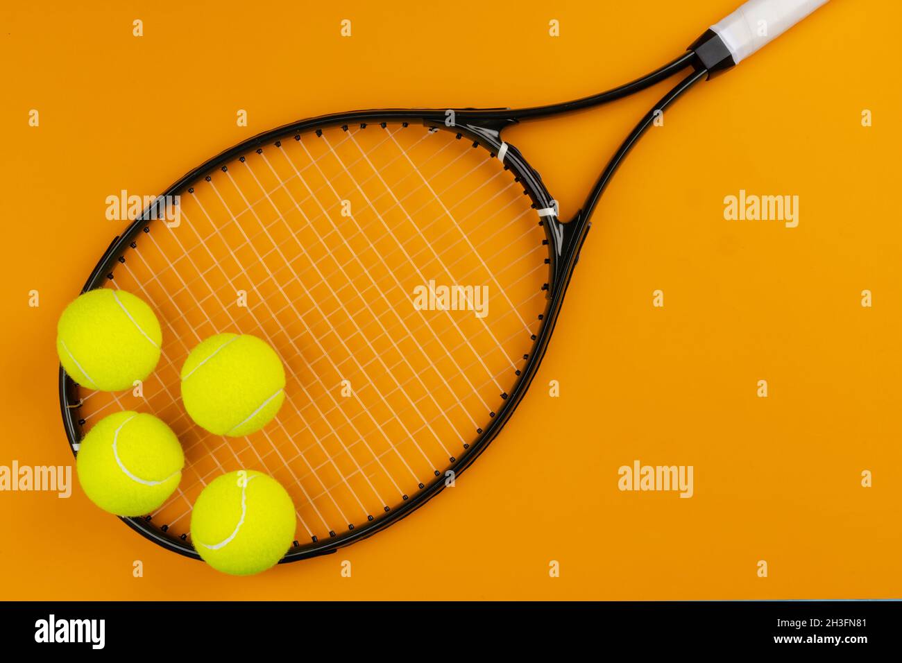 Tennis player sport equipment. Tennis racket and ball Stock Photo Alamy