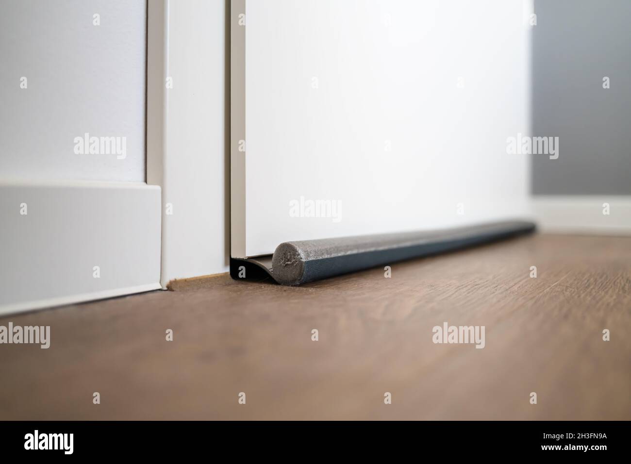 Door Draft Stopper Or Excluder. Stop Cold Air Stock Photo Alamy