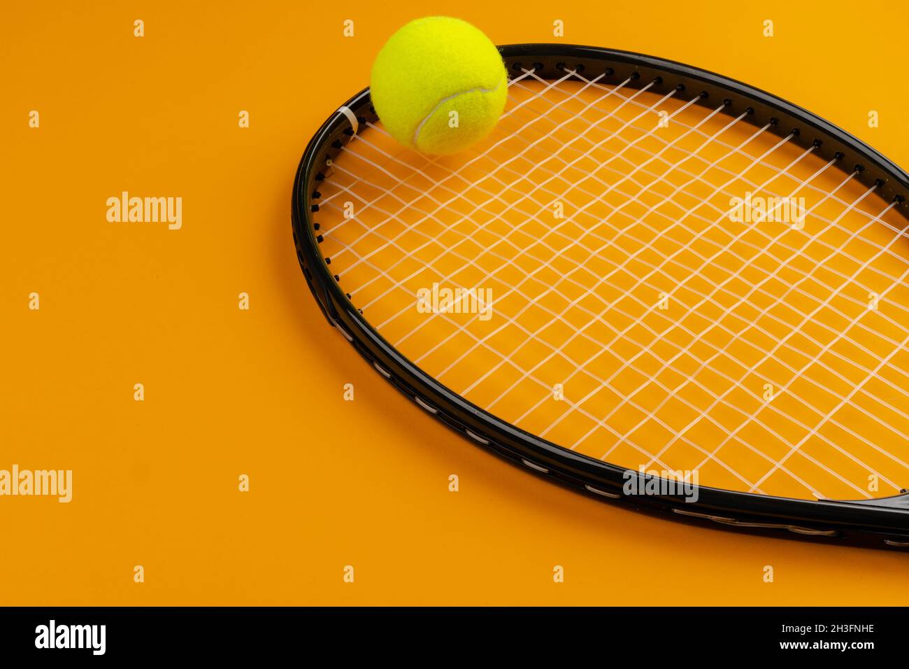 Ball And Racket Instrument Tennis player sport equipment. Tennis racket and ball Stock Photo - Alamy