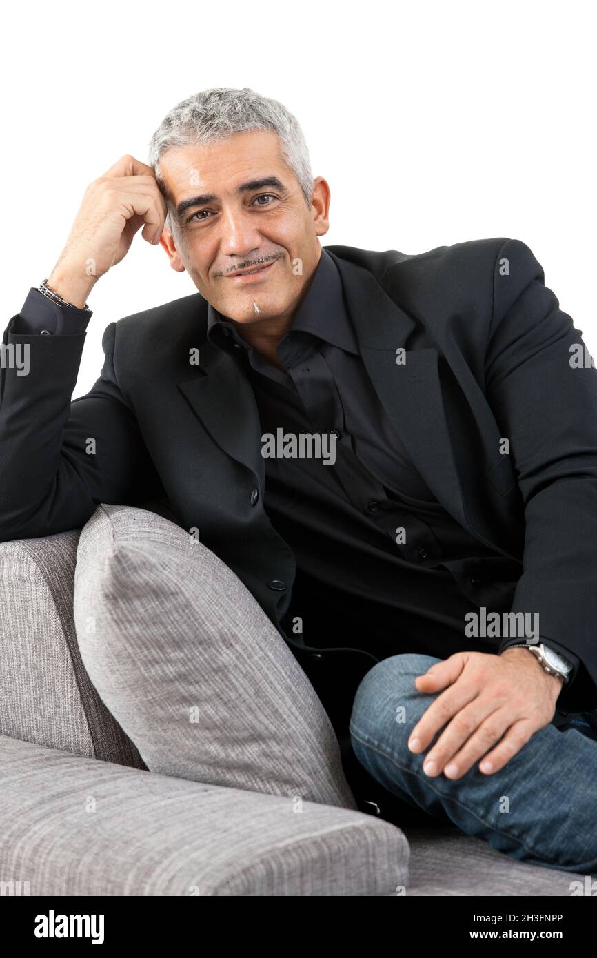 Mature man seated in hi-res stock photography and images - Alamy