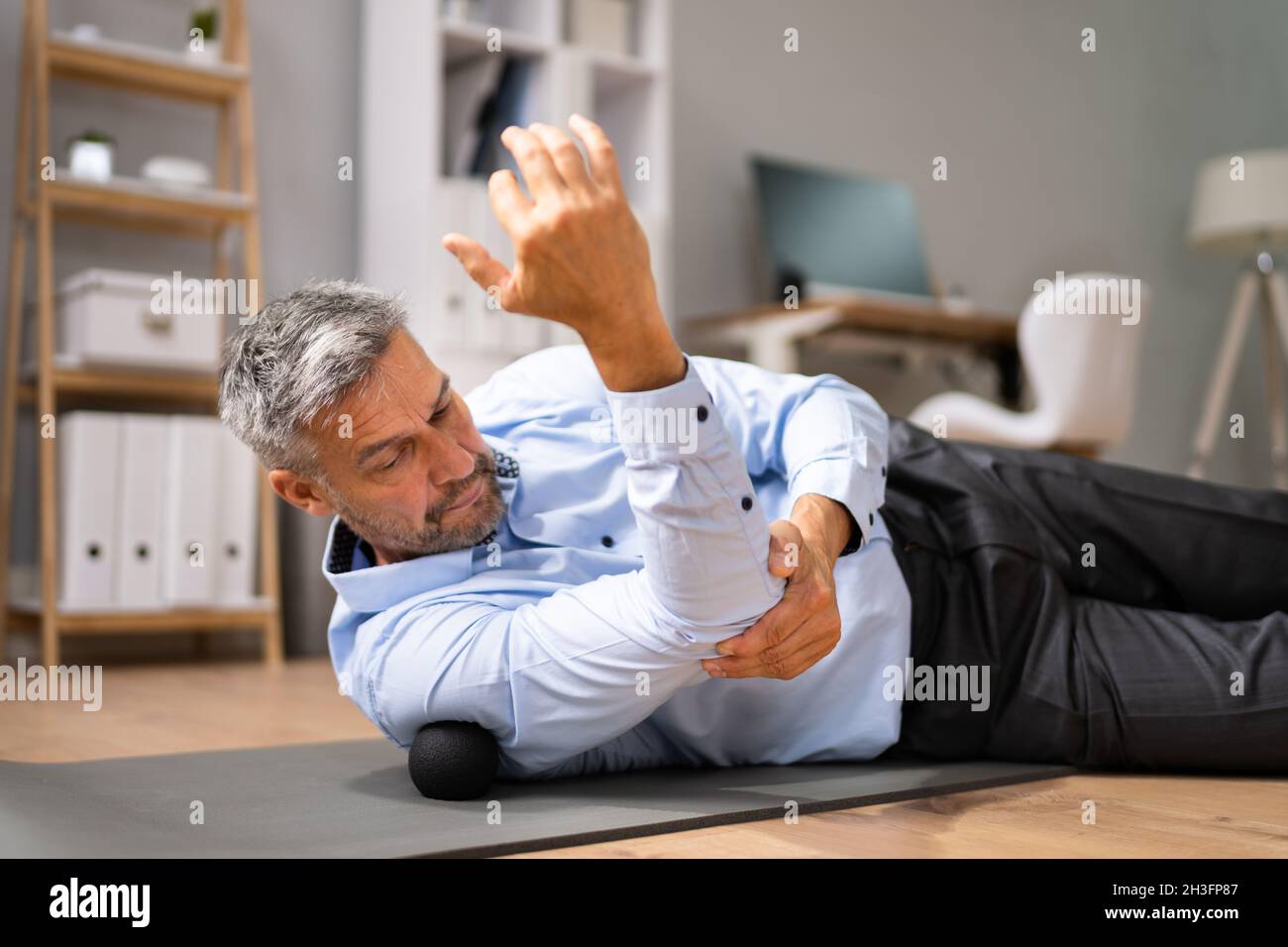 Back Trigger Point Massage Using Foam Ball Myofascial Release Stock Photo Alamy