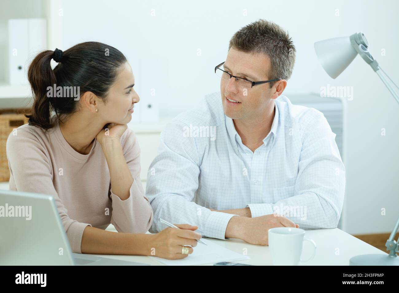 Couple working at home Stock Photo