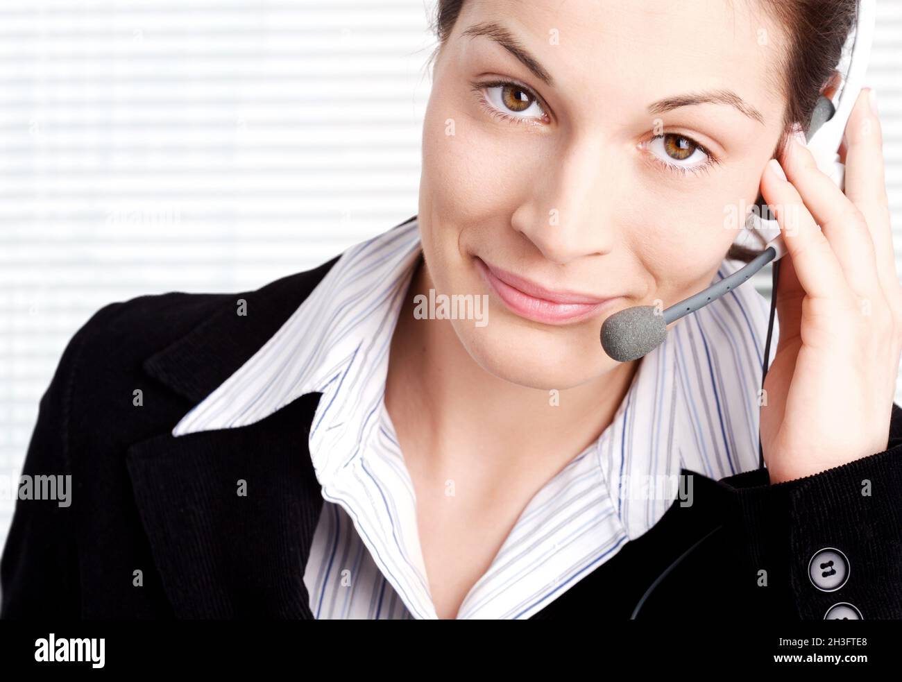Operator with headset Stock Photo - Alamy