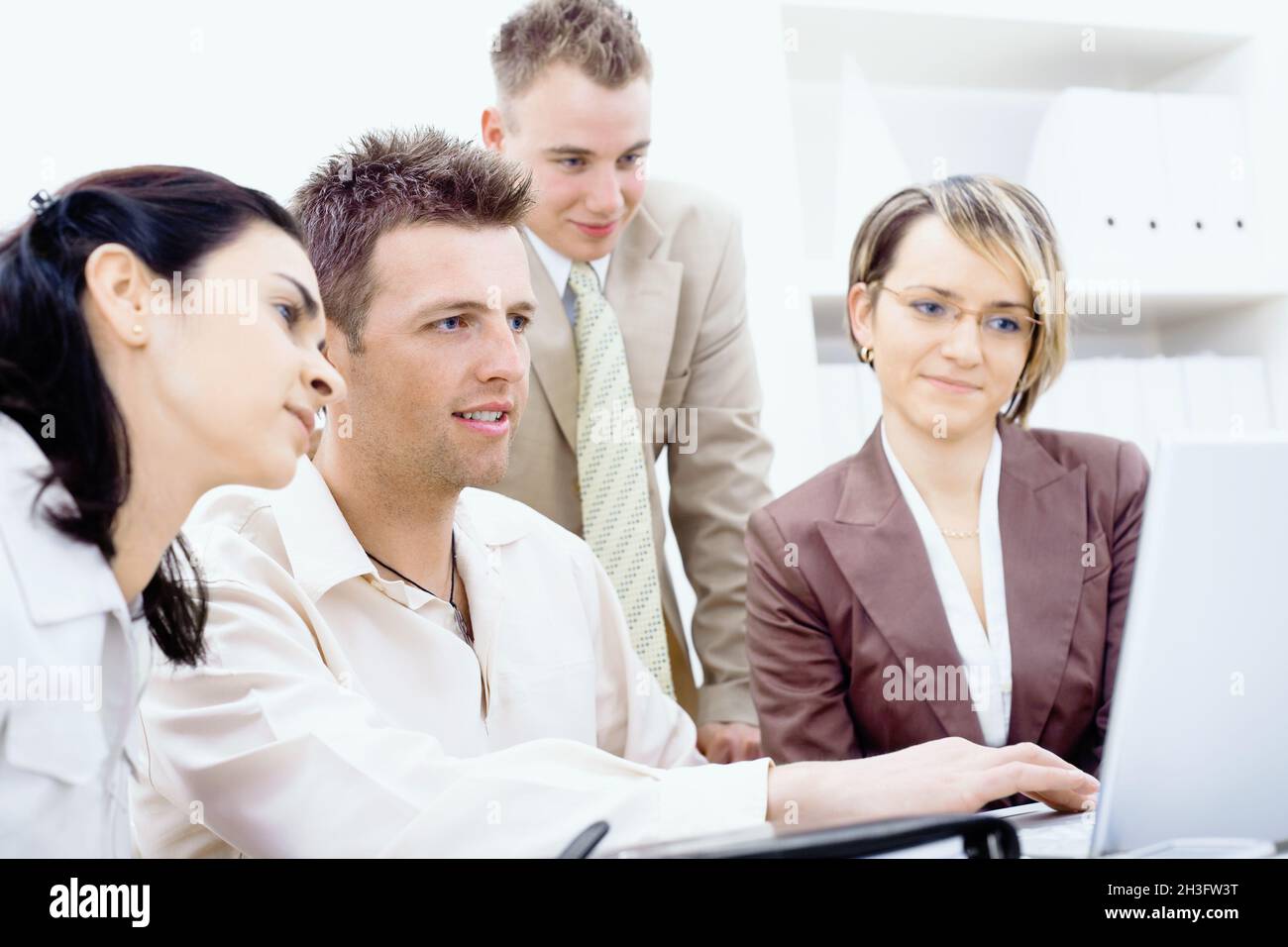Colleagues wearing business attire hi-res stock photography and images ...