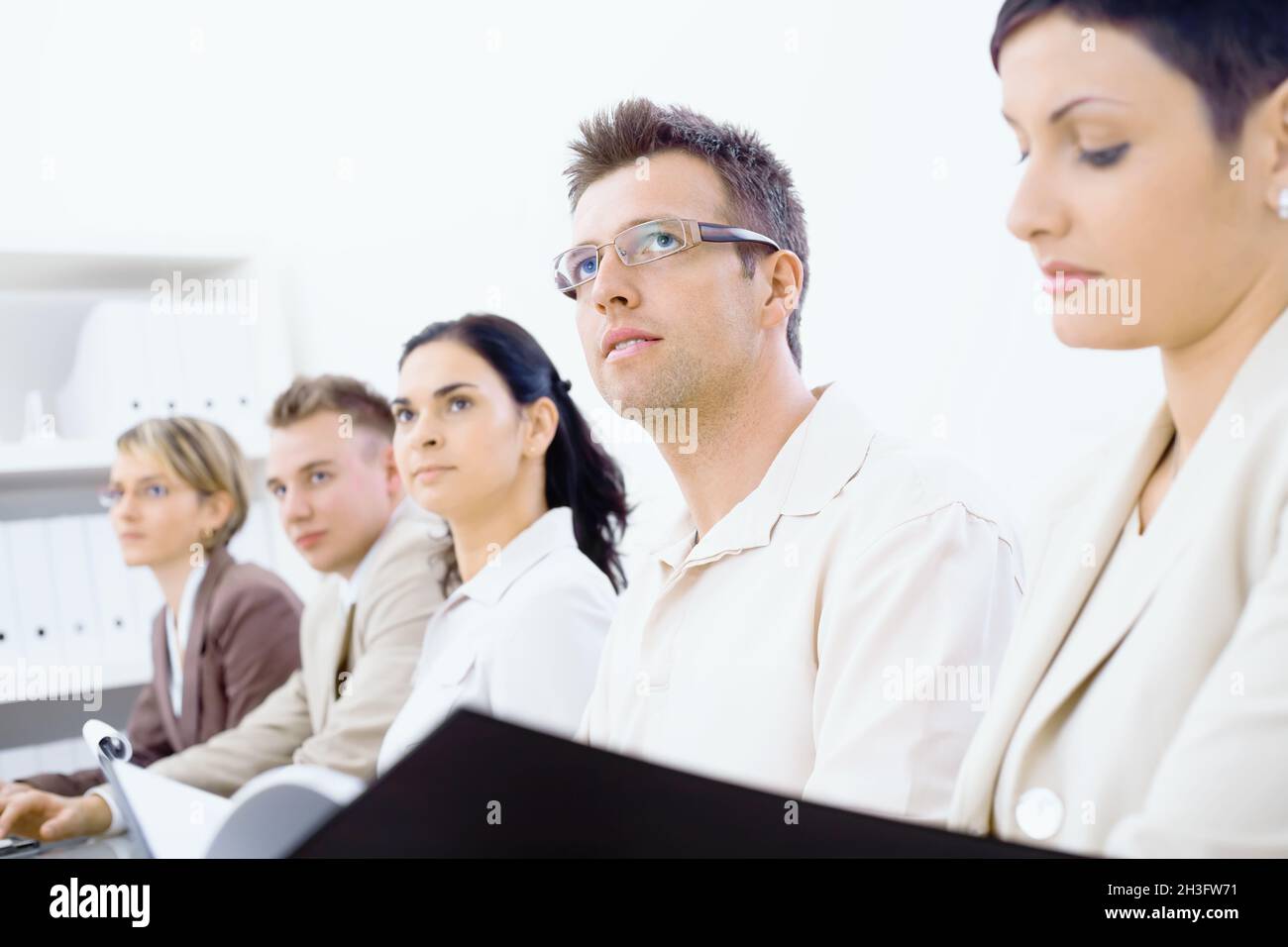 Colleagues wearing business attire hi-res stock photography and images ...