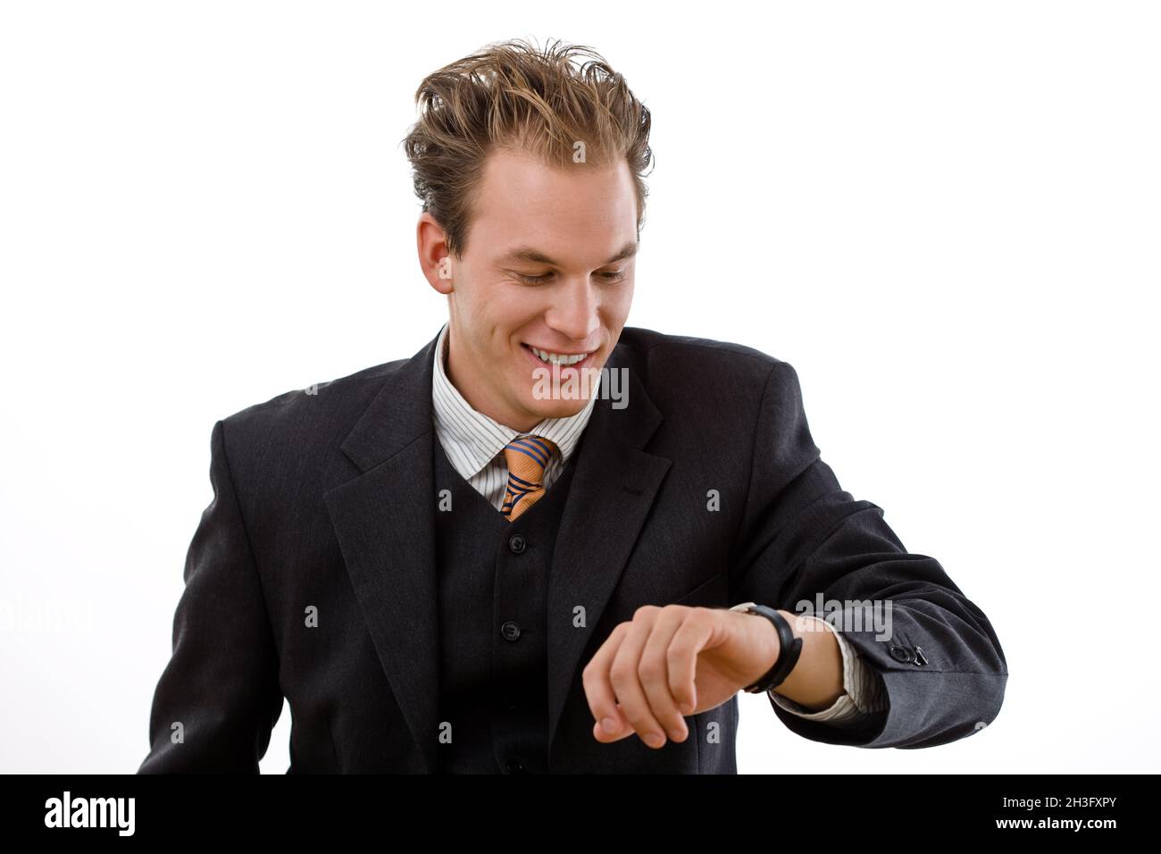 Businessman checking time Stock Photo