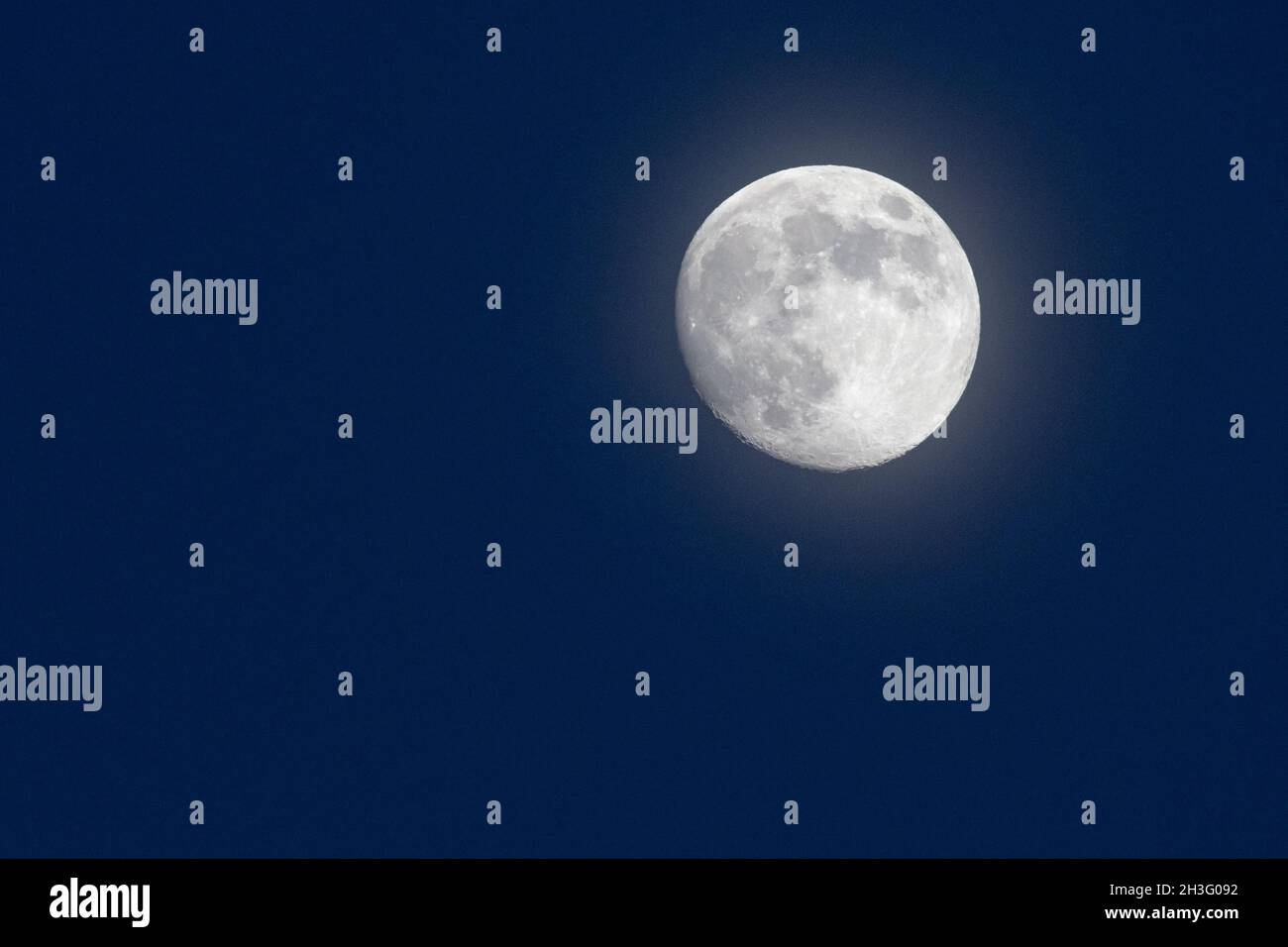 Beautiful view of the full moon in the night sky Stock Photo - Alamy