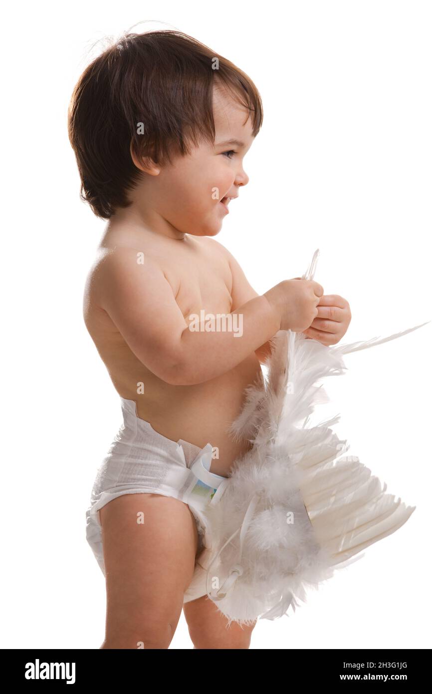 Baby girl holding angel wings Stock Photo