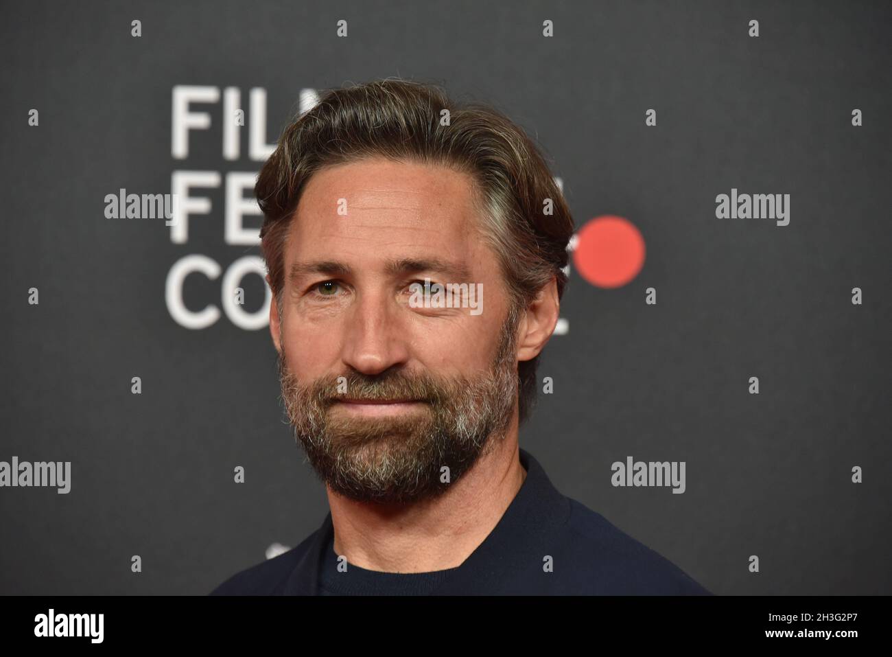 Cologne, Germany. 26th Oct, 2021. Actor Benjamin Sadler arrives for the screening of the film "Das weisse Haus am Rhei" at the Film Festival Cologne. Credit: Horst Galuschka/dpa/Alamy Live News Stock Photo