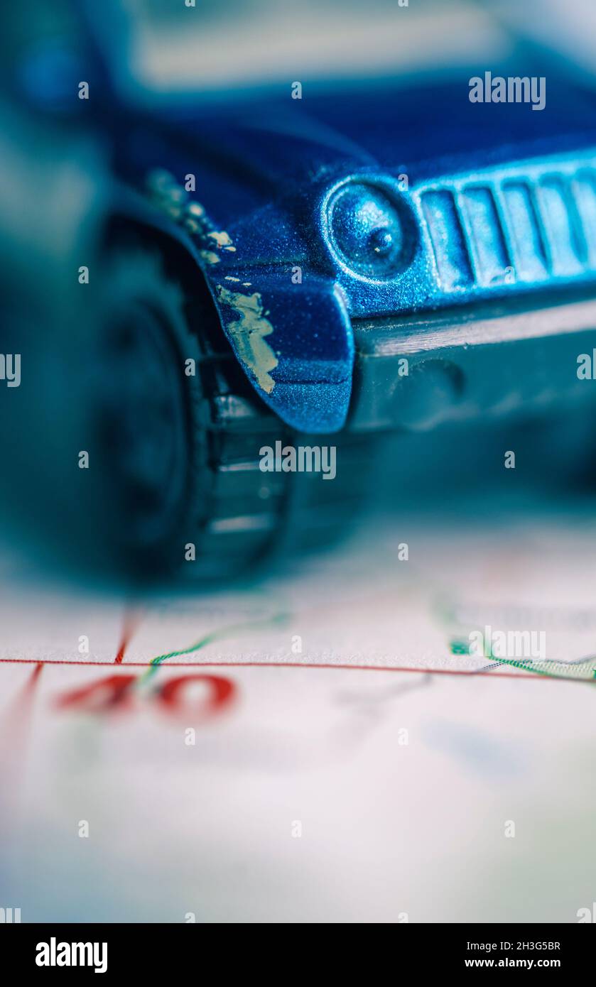 Toy car on a road map Stock Photo