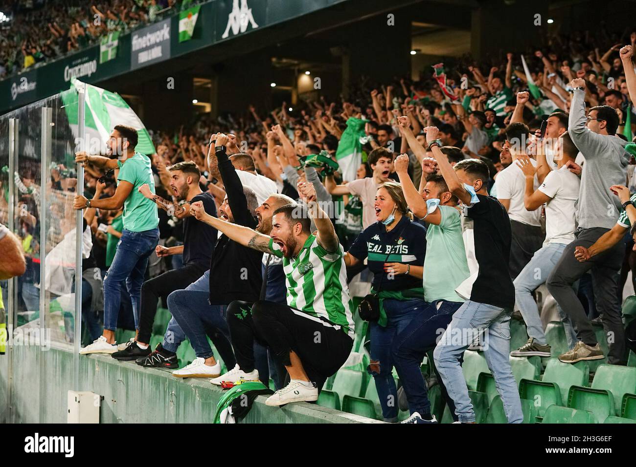 Seville, Spain. 27th Oct, 2021. Real Betis fans seen celebrating a goal during the La Liga Santander match between Real Betis and Valencia CF at Benito Villamarin Stadium. (Final Score: Real Betis 4:1 Valencia CF). Credit: SOPA Images Limited/Alamy Live News Stock Photo