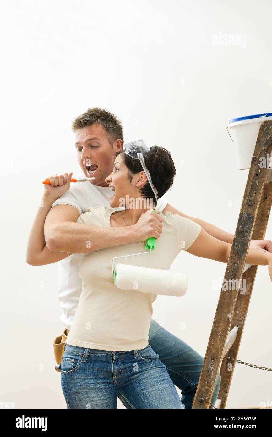 Happy couple painting Stock Photo