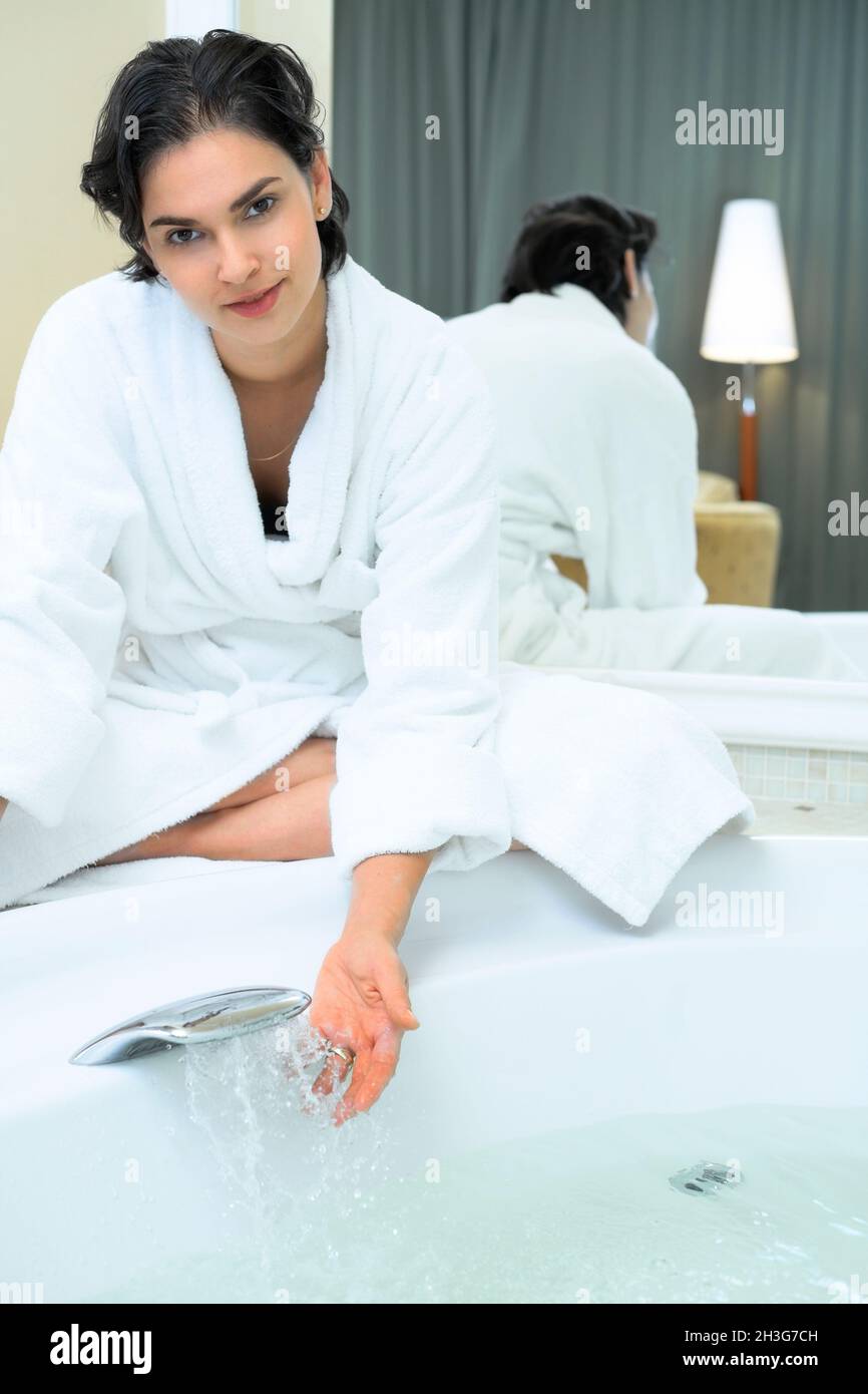Women in the bathroom Stock Photo - Alamy