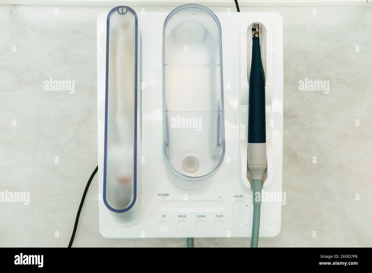 Ultrasonic scaler in the dental office. Dentistry Concept Stock Photo