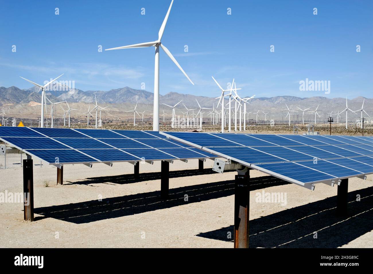 Wind turbines and solar panels in the Sonora Desert near Palm Springs, California Stock Photo