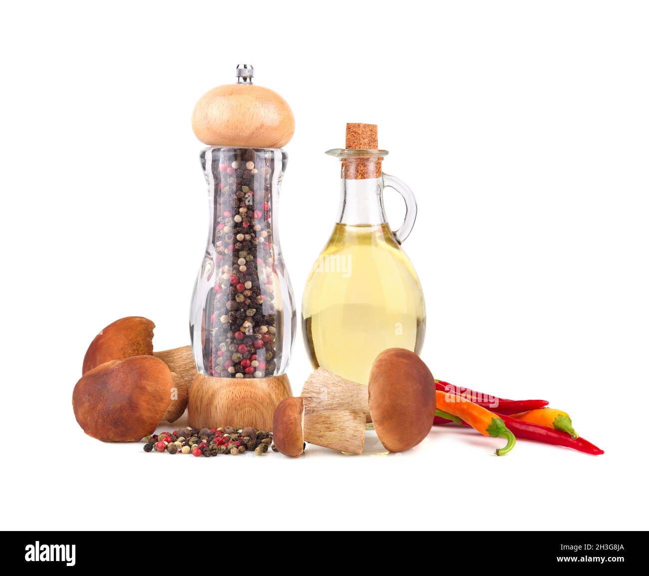 Pepper mill with Olive oil, king boletus mushrooms and chili pepper