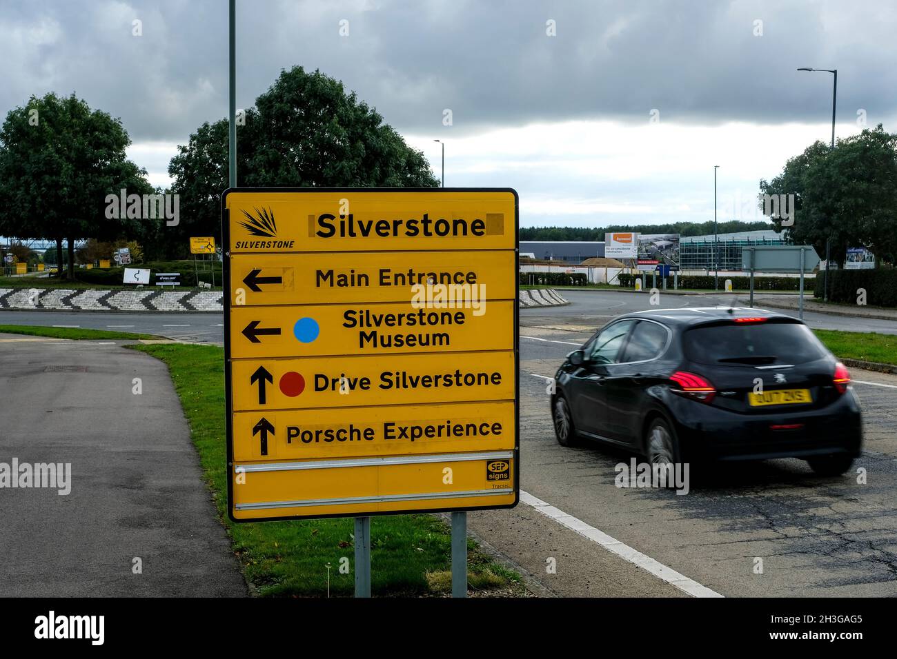 A sign giving directions to the various attractions at Silverstone Circuit, Northamptonshire, UK Stock Photo