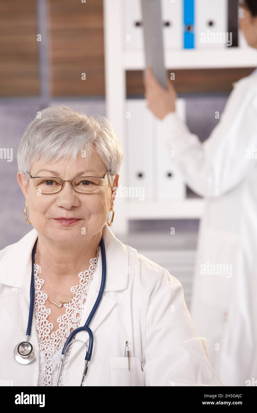 Senior nurse looking camera hi-res stock photography and images - Alamy