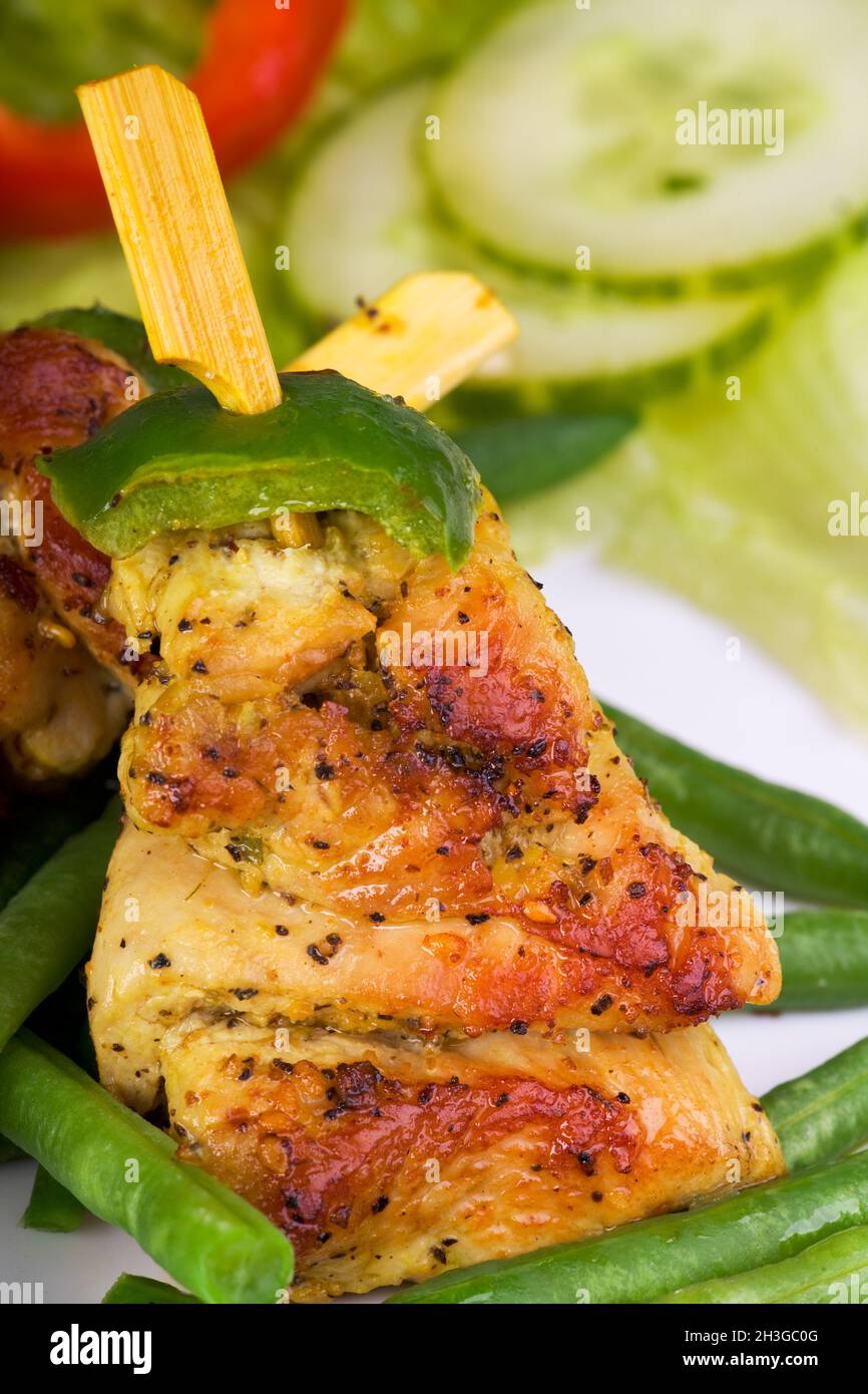 Grilled chicken skewer with salad Stock Photo