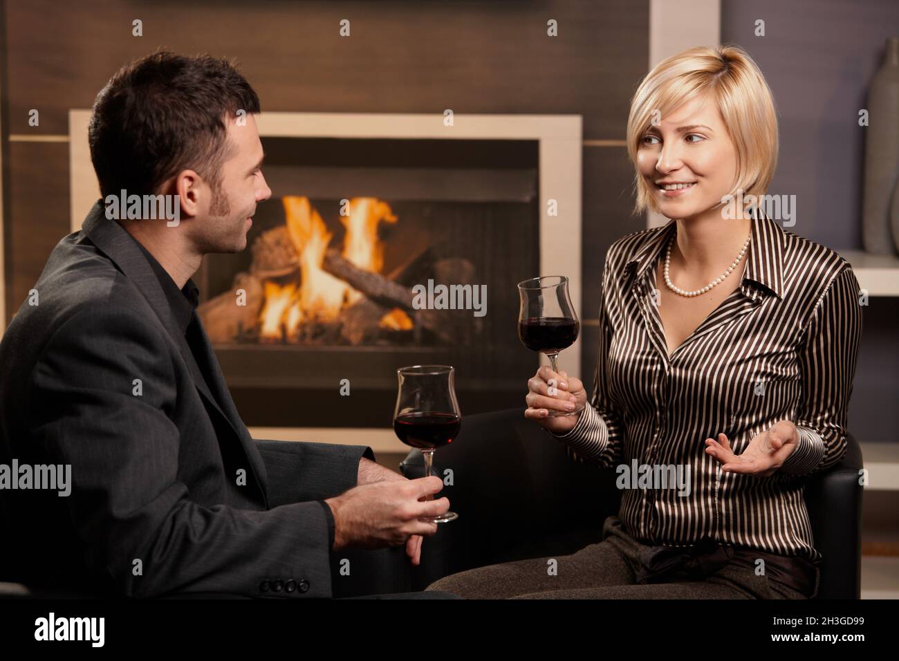 Elegant couple drinking wine Stock Photo