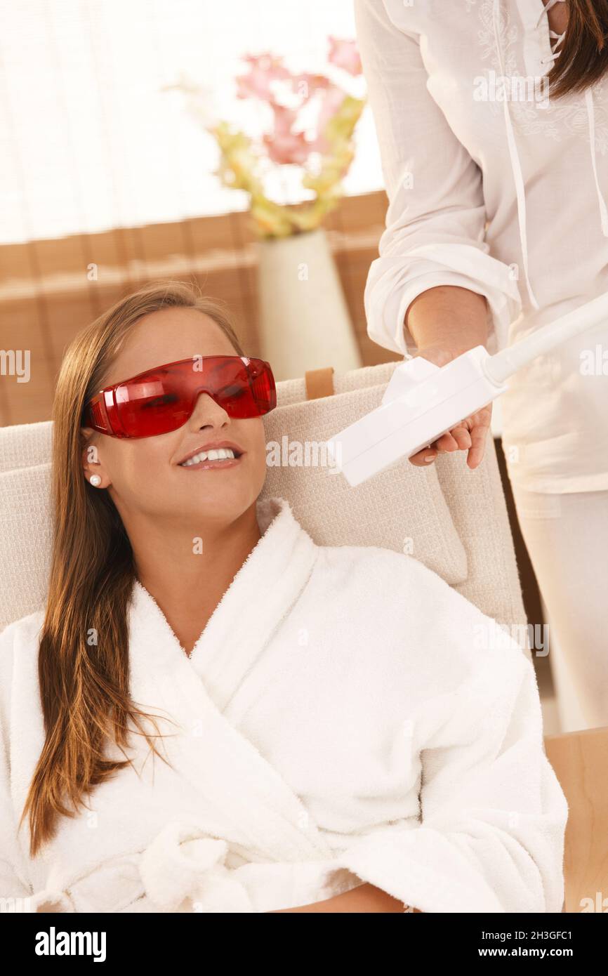 Woman smiling after laser tooth whitening Stock Photo Alamy