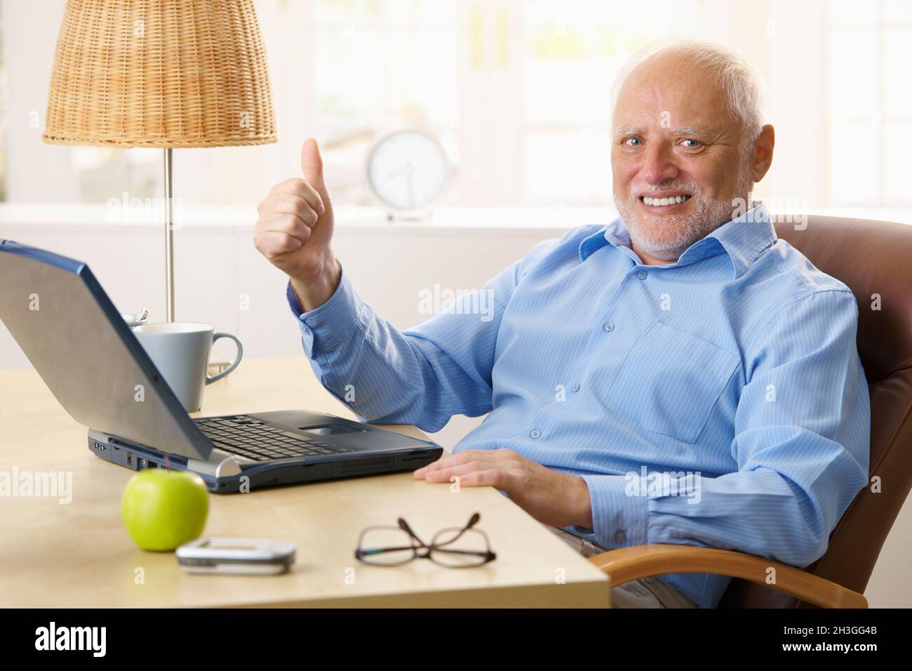 Happy senior man giving thumb up Stock Photo - Alamy