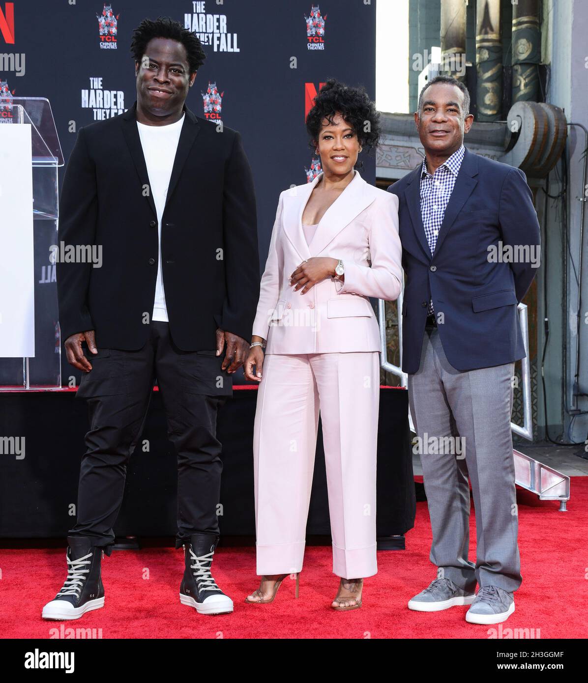 Hollywood, United States. 28th Oct, 2021. HOLLYWOOD, LOS ANGELES, CALIFORNIA, USA - OCTOBER 28: Actor Jeymes Samuel, actress Regina King and director James Lassiter attend the Handprints And Footprints Ceremony honoring Regina King held at the TCL Chinese Theatre IMAX Forecourt on October 28, 2021 in Hollywood, Los Angeles, California, United States. (Photo by Xavier Collin/Image Press Agency) Credit: Image Press Agency/Alamy Live News Stock Photo