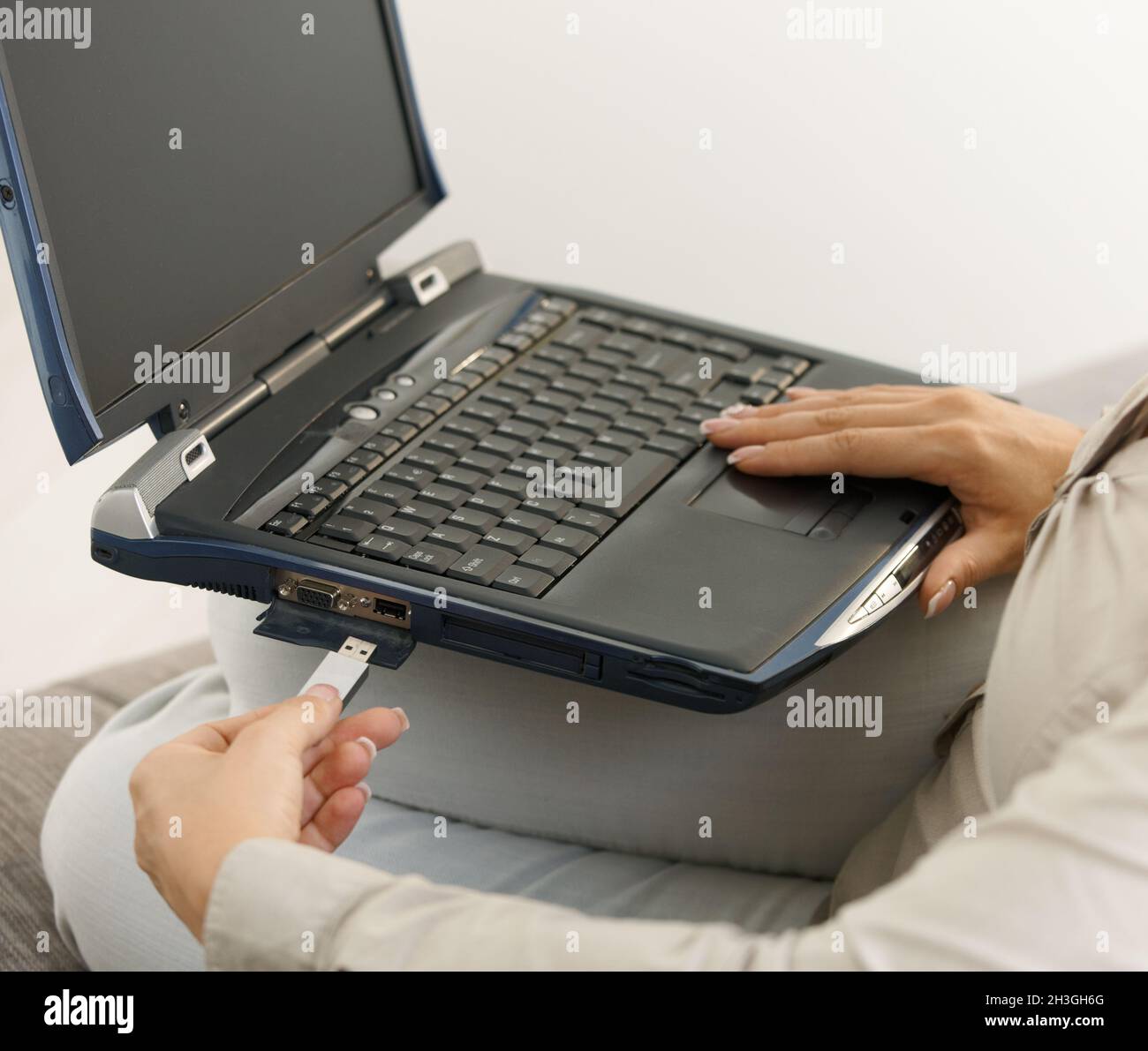 Closeup of plugging in flash drive Stock Photo Alamy