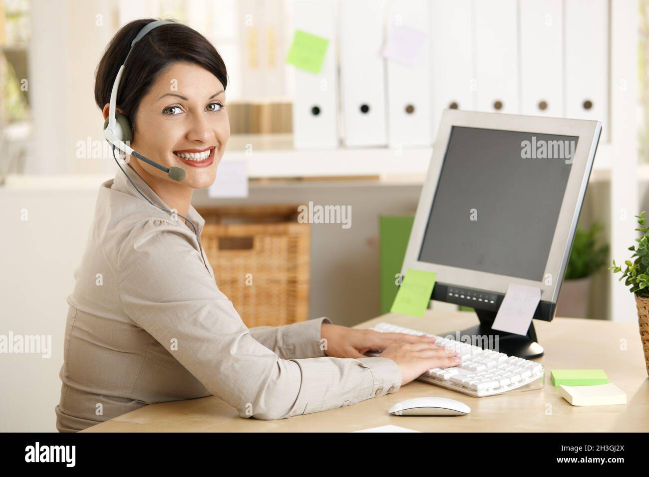 Assistant headphone hi-res stock photography and images - Alamy