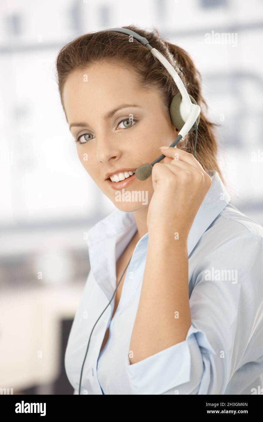 Portrait of attractive girl using headphones Stock Photo
