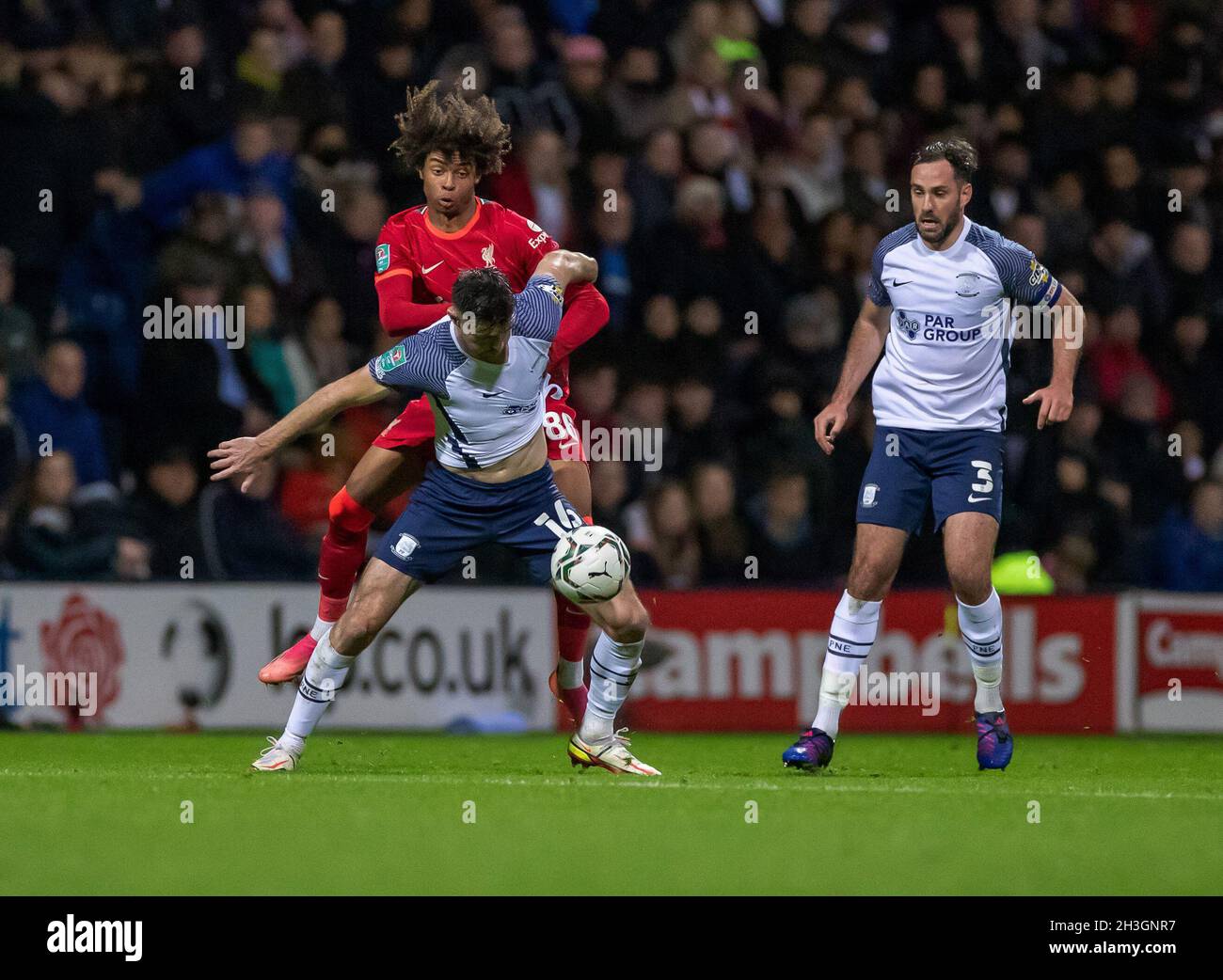Deepdale Stadium, Preston, Lancashire, UK. 27th Oct, 2021. Carabao Cup football, Preston North End versus Liverpool; Harvey Blair of Liverpool is surrounded by Andrew Hughes and Cunningham of Preston North End Credit: Action Plus Sports/Alamy Live News Stock Photo