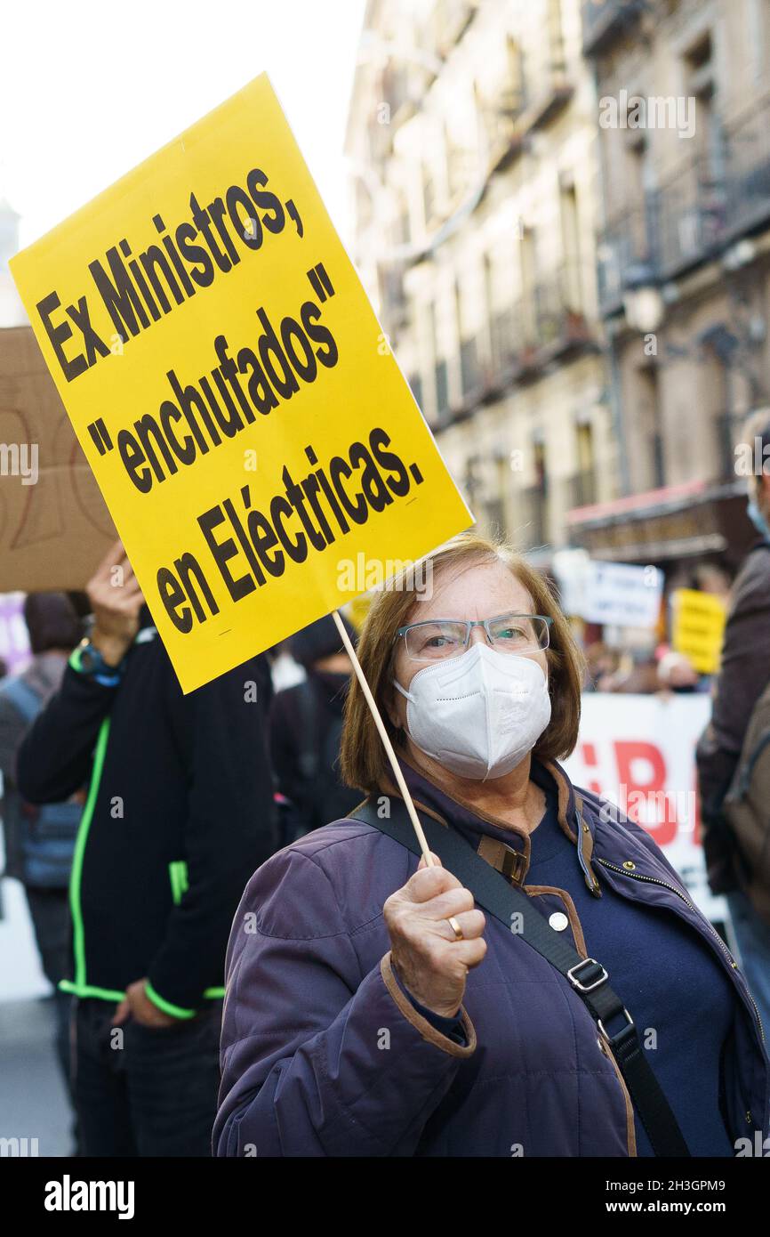 A protester holds a placard during the demonstration.People held a protest against the increase