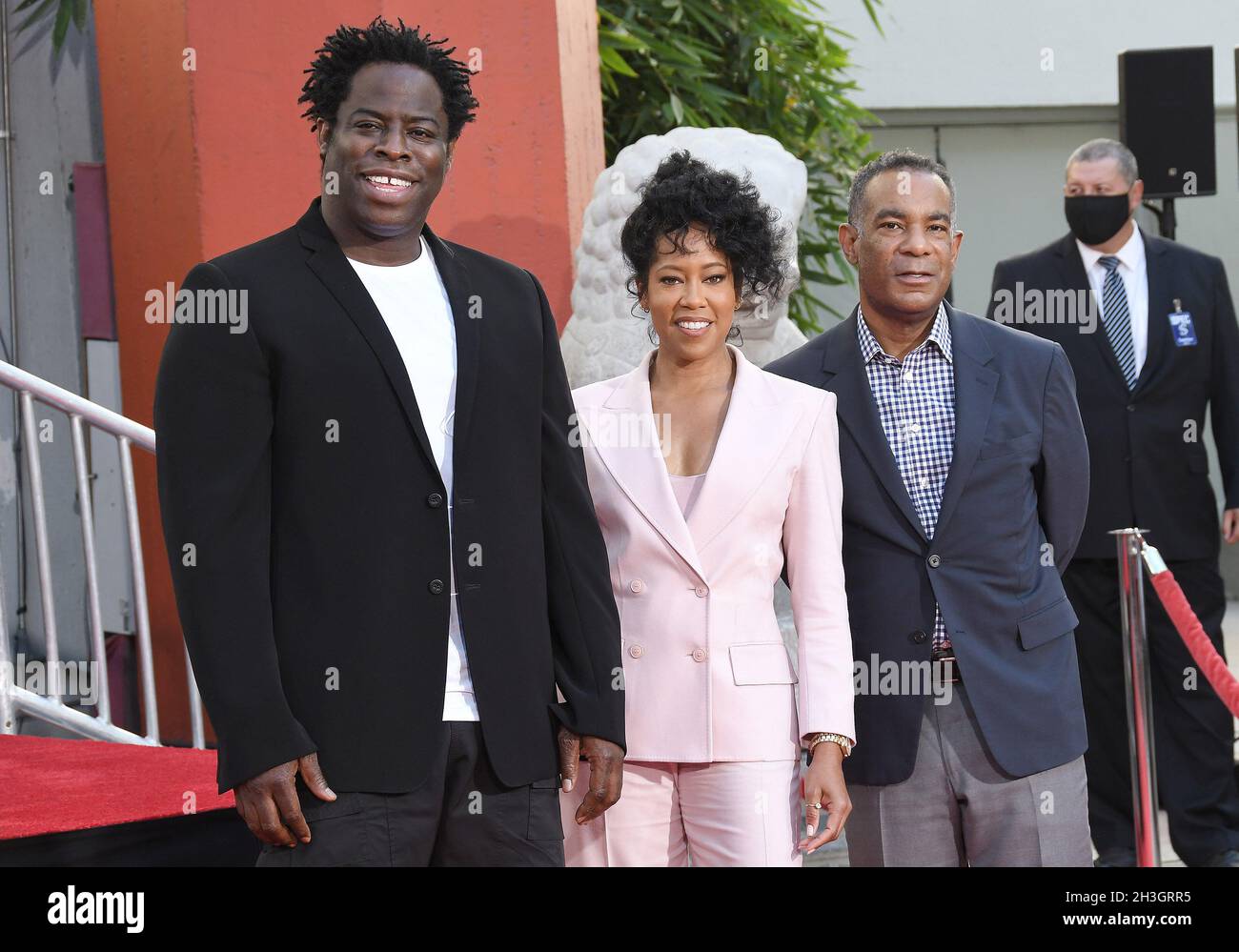 Los Angeles, USA. 28th Oct, 2021. (L-R) Jeymes Samuel, Regina King, and James Lassiter at Regina King's Hand & Footprint Ceremony held at the TCL Chinese Theatre in Hollywood, CA on Thursday, ?October 28, 2021. (Photo By Sthanlee B. Mirador/Sipa USA) Credit: Sipa USA/Alamy Live News Stock Photo